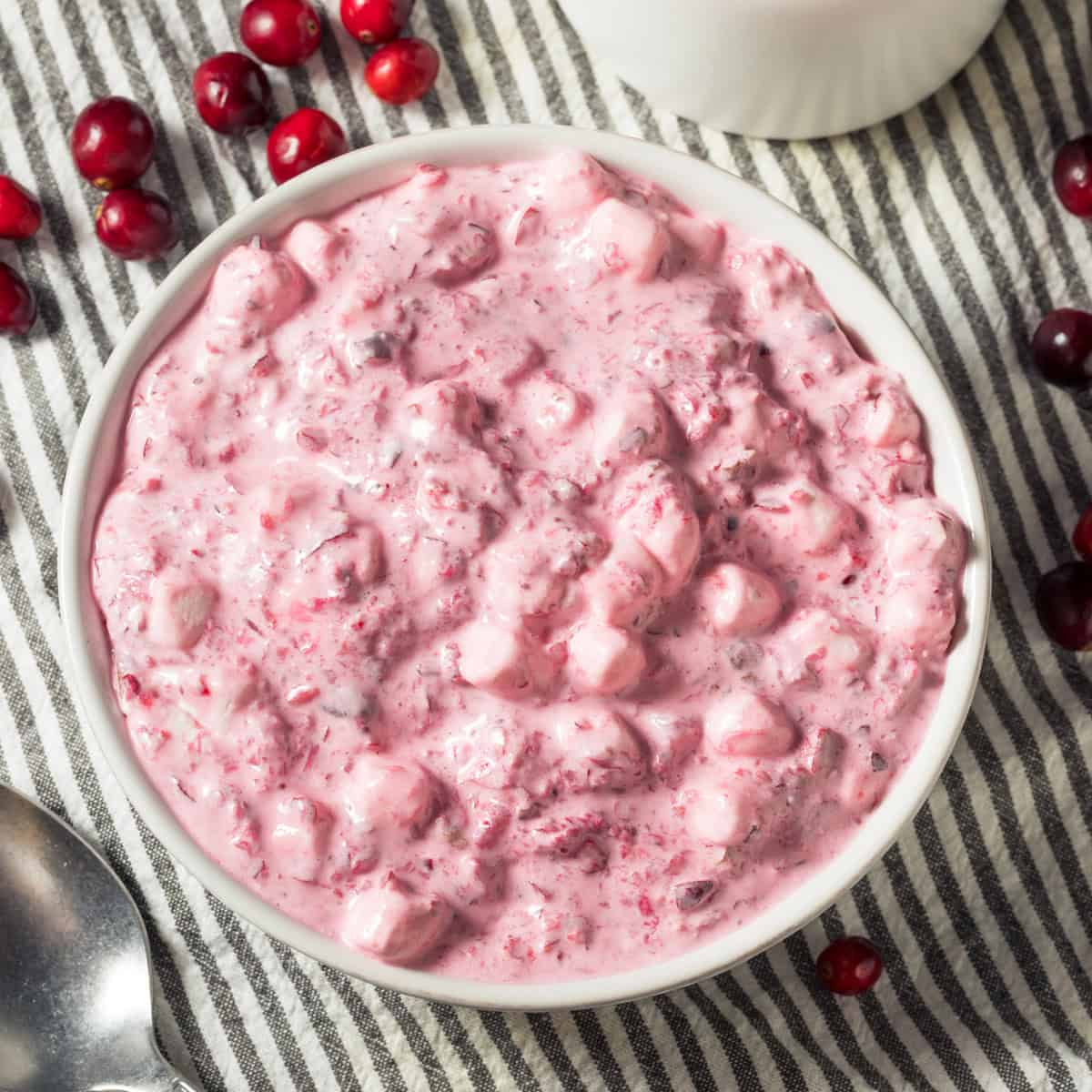 vintage cranberry fluff salad recipe in a white bowl