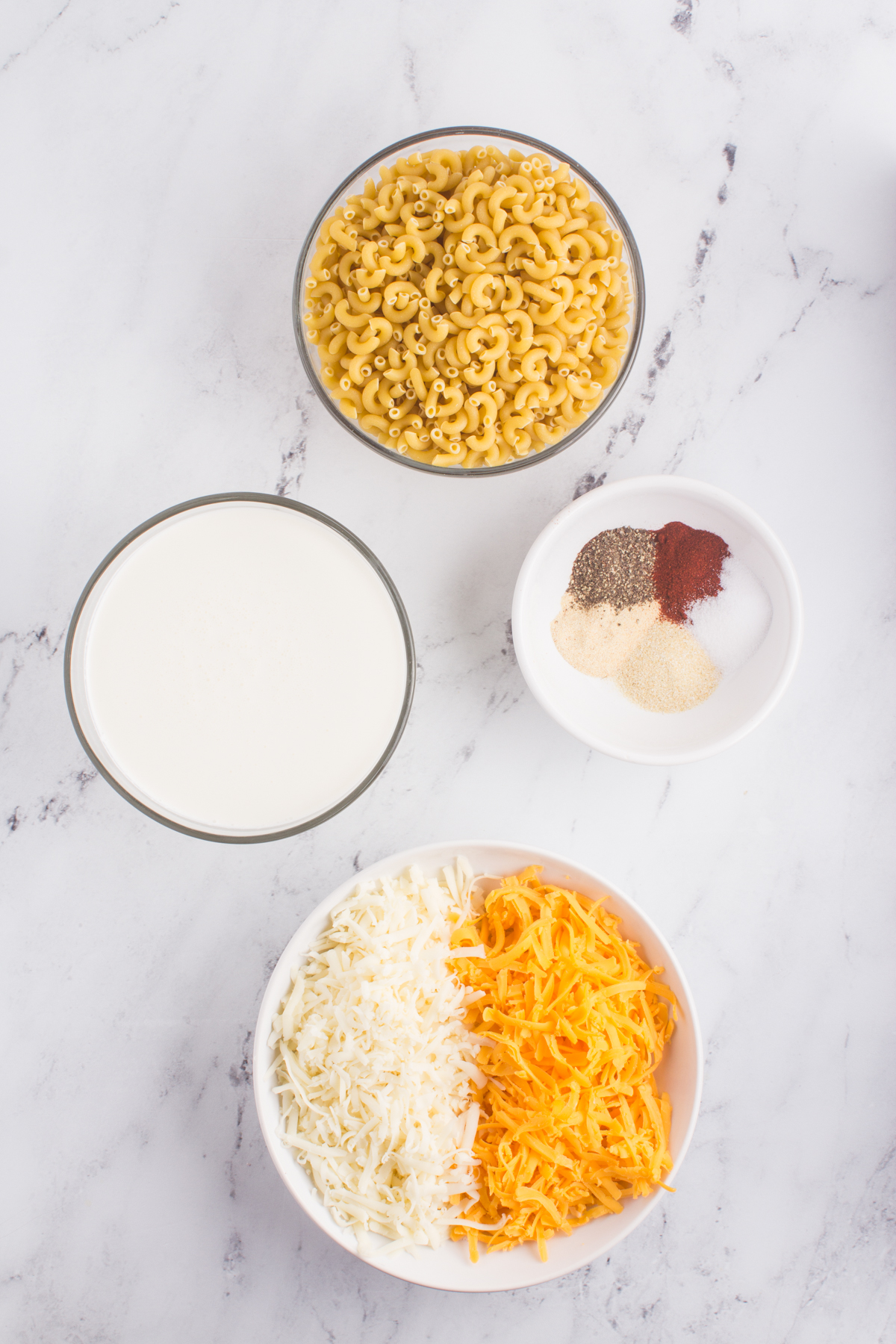a picture of the ingredients needed to make mac and cheese