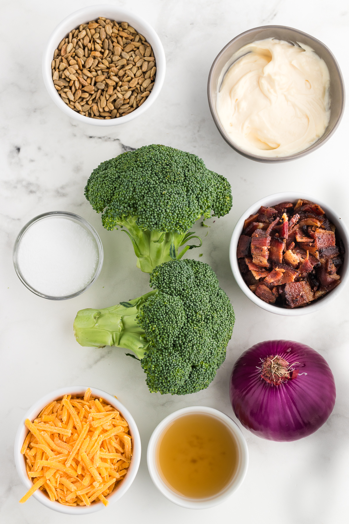 ingredients for broccoli salad set out on counter