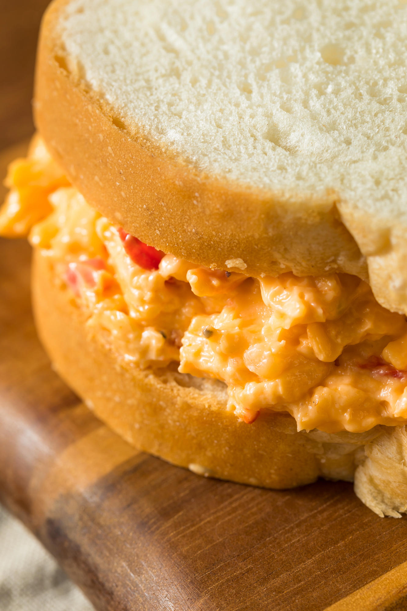 old fashioned pimento cheese sandwich between two layers of thick white bread