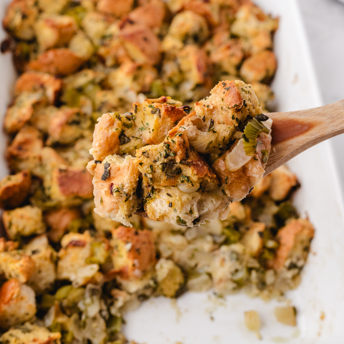 close up of grandmas stuffing on a wooden spoon