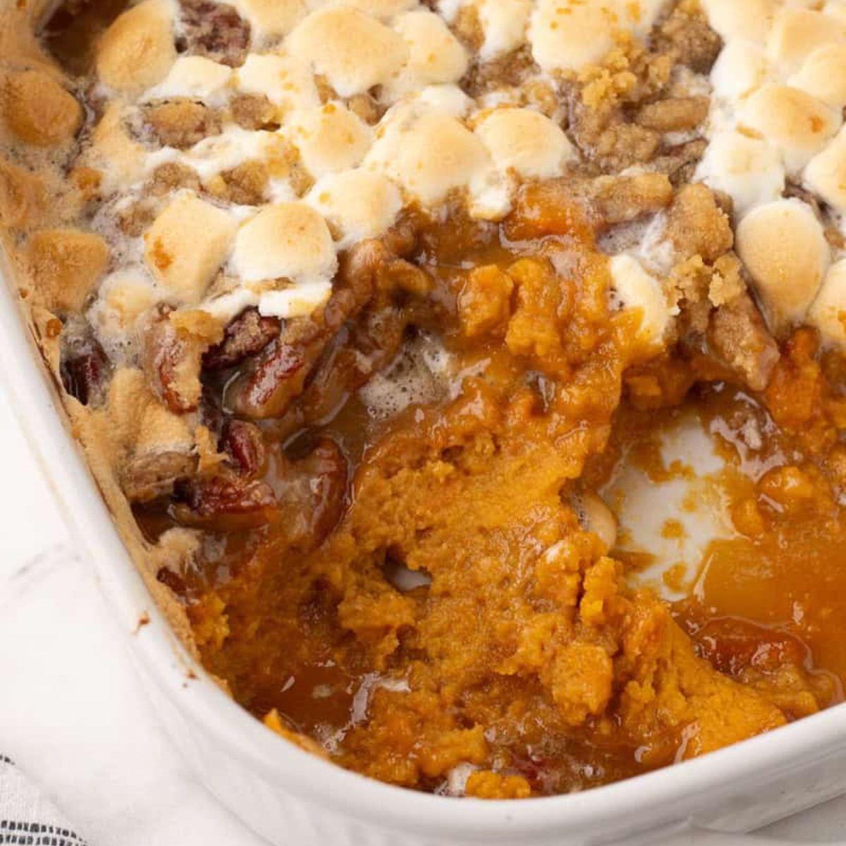featured close up of easy canned sweet potatoes and marshmallows casserole