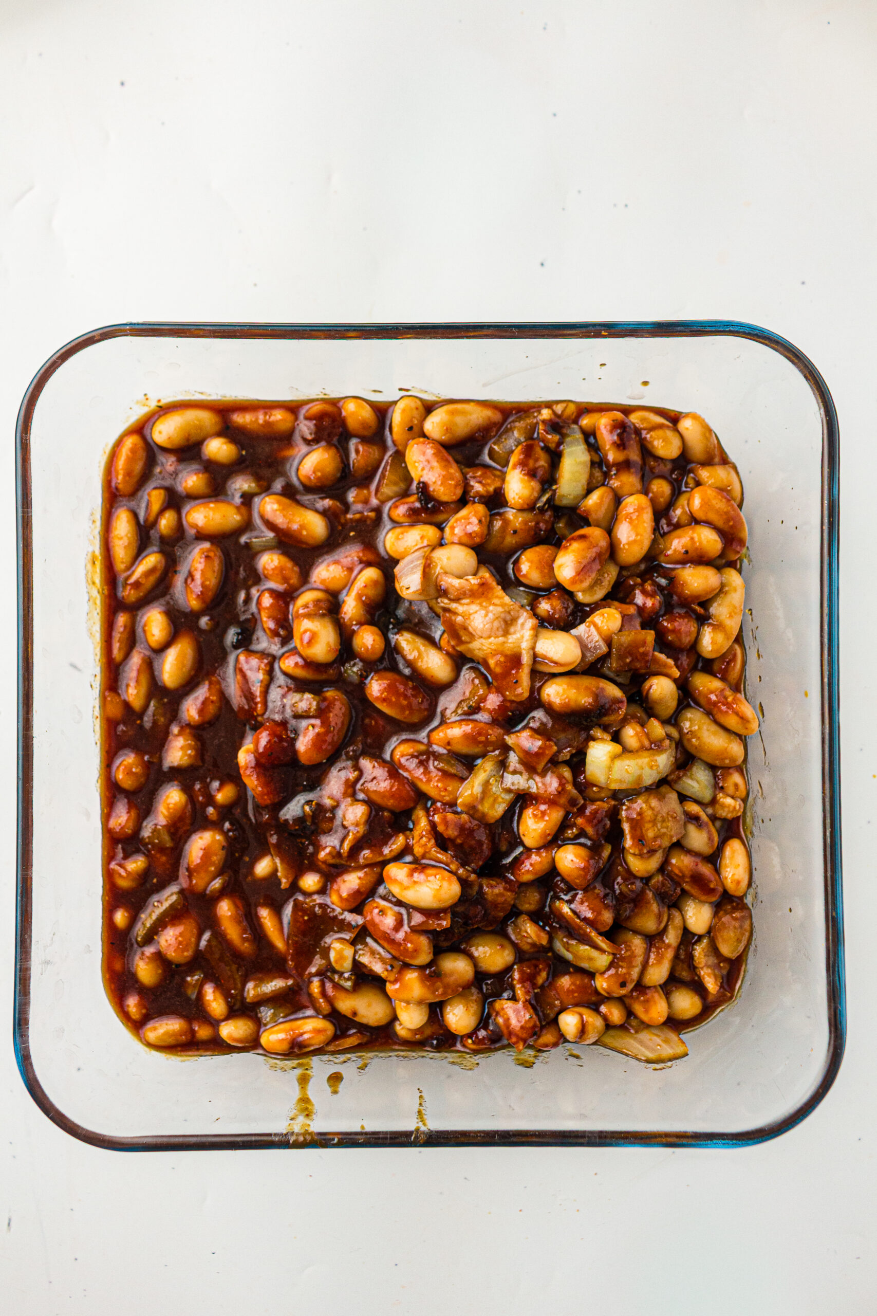 Southern baked beans in a baking dish.