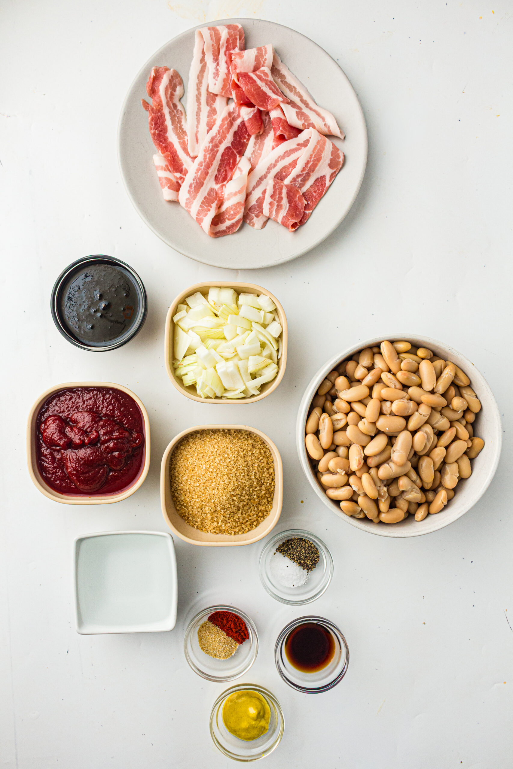 Image of ingredients needed to make Southern baked beans on a table.