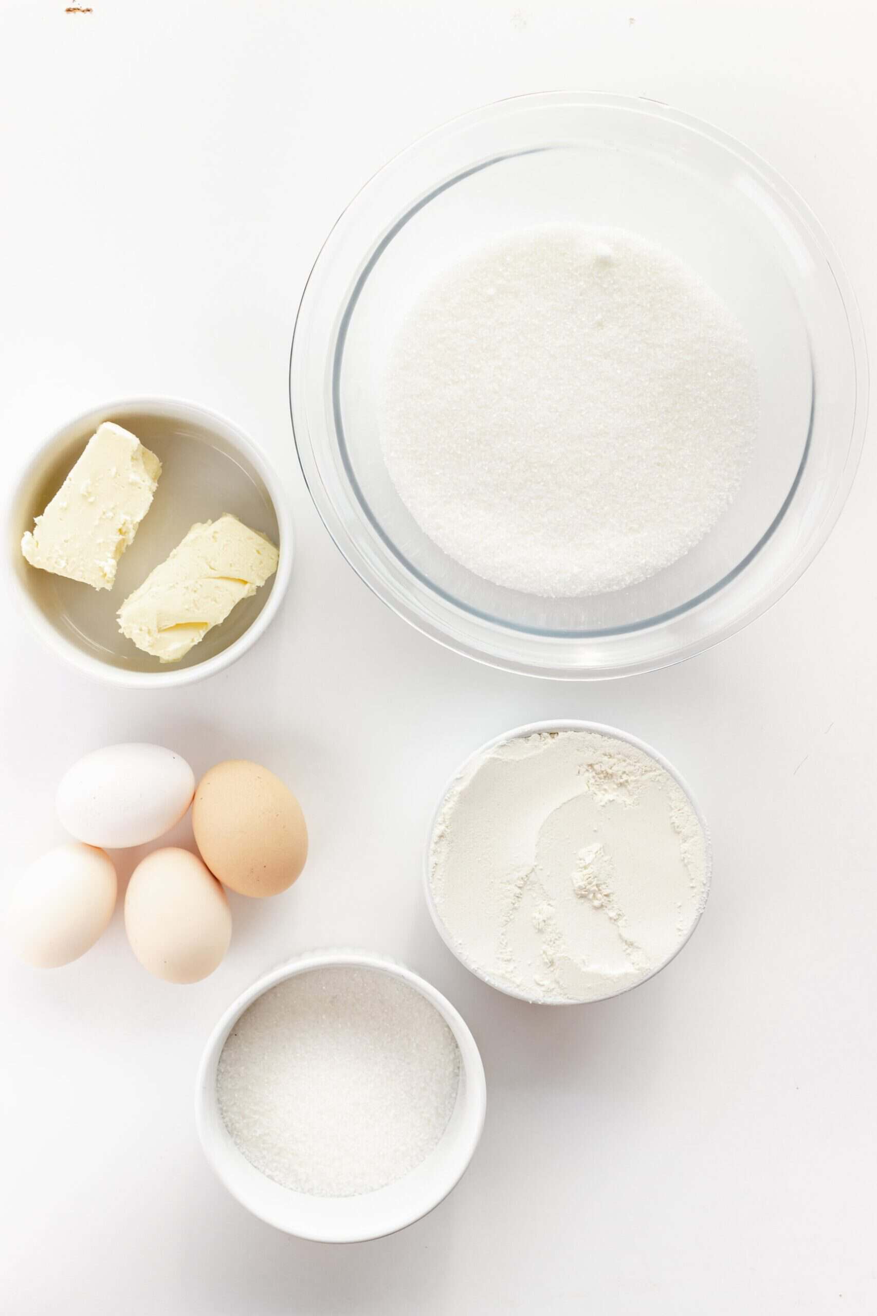 Ingredients for Christmas butter cookies: butter, sugar, eggs and flour