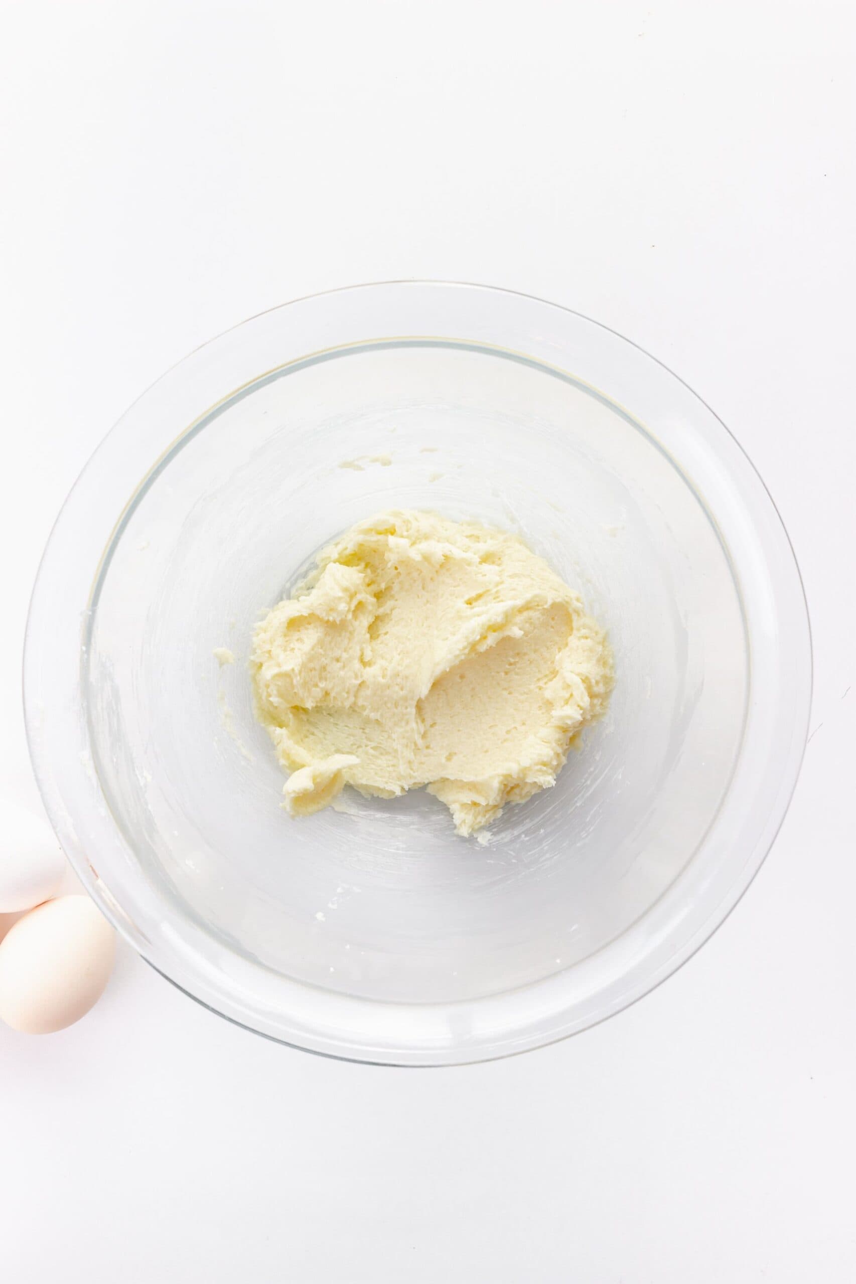Butter and sugar creamed in a glass bowl for butter cookie dough