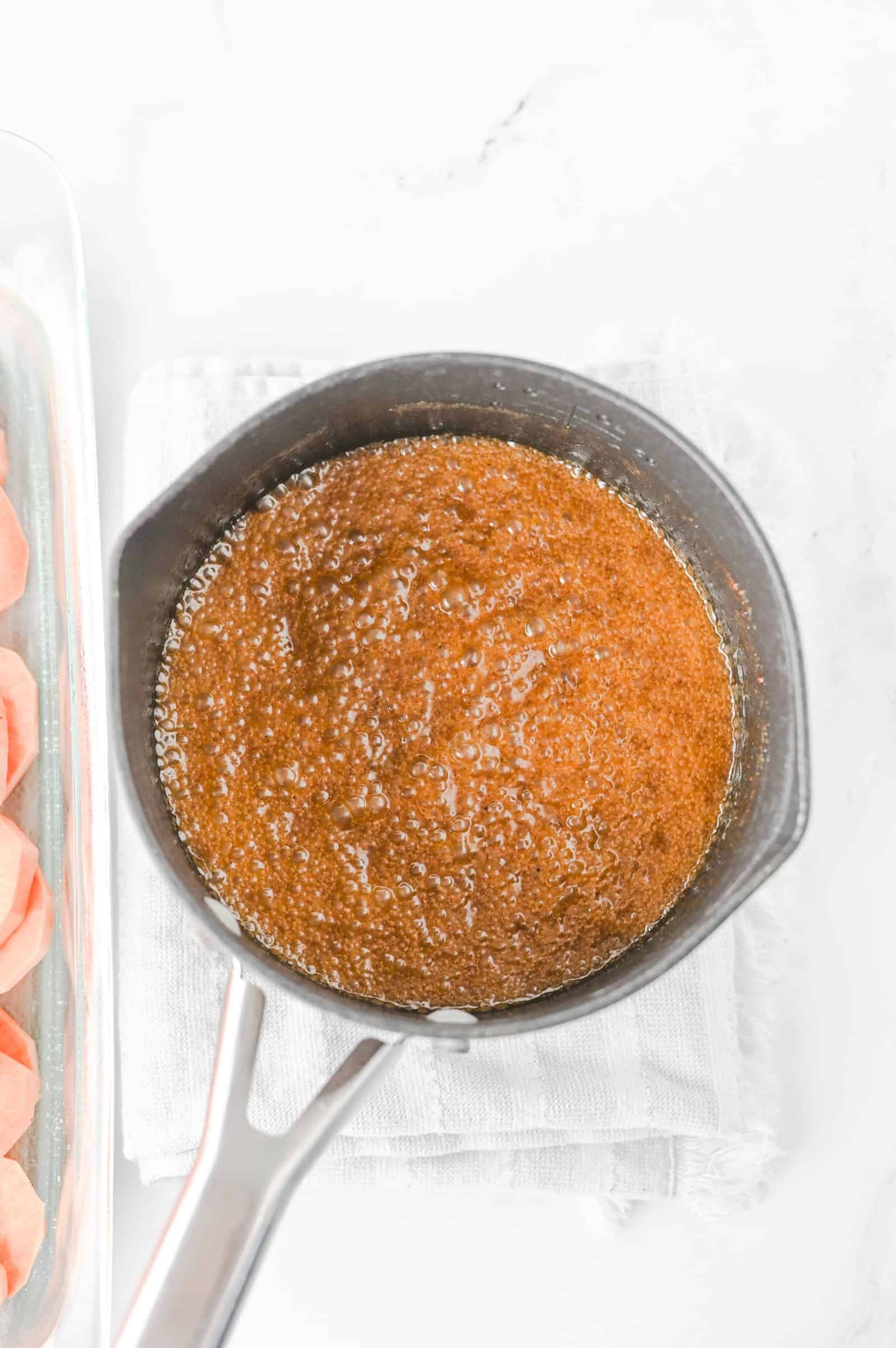 Brown sugar and maple syrup mixture in a saucepan.