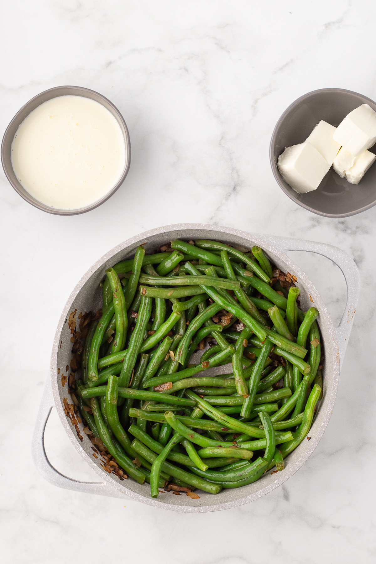 Old fashioned homemade green bean casserole with crispy fried onions