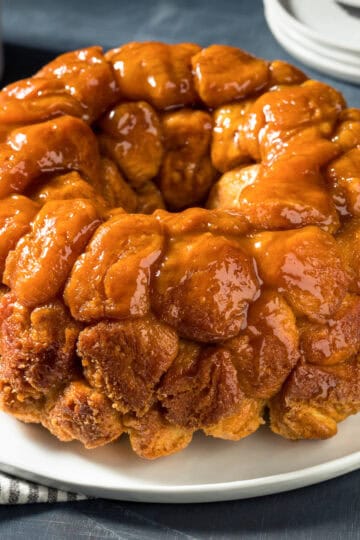 Golden, gooey monkey bread made with canned biscuits, cinnamon sugar, and buttery brown sugar glaze.